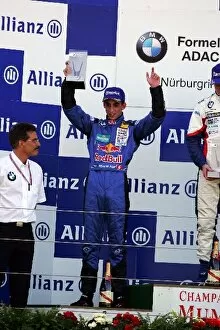 Formula BMW ADAC: Second placed Sebastien Buemi Muecke Motorsport celebrates on the podium