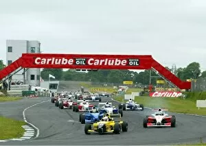 Images Dated 13th June 2004: Formula BMW UK Championship: Race winner Josh Fisher leads into the first corner