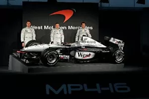 Images Dated 7th February 2001: Formula One Launch: David Coulthard, Alex Wurz and Mika Hakkinen unveil the new McLaren