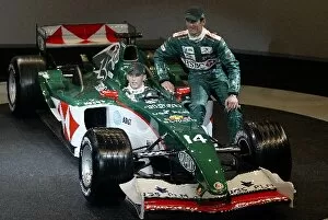Images Dated 18th January 2004: Formula One Launch: R-L: Mark Webber and Christian Klien, in car, with the new Jaguar Cosworth R5