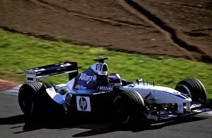 Images Dated 9th December 2002: Formula One Testing: BMW European Touring Car driver Dirk Muller tests the BMW Williams FW24