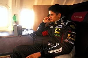 Images Dated 3rd October 2002: Formula One World Championship: Alex Yoong Minardi, relaxes on the flight to Australia