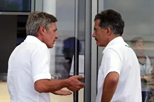 Images Dated 22nd August 2008: Formula One World Championship: Daniel Morelli driver manager talks with Dr Mario Theissen BMW