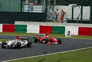 Images Dated 12th October 2003: Formula One World Championship: Eighth placed World champion Michael Schumacher Ferrari F2003-GA