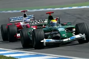 Images Dated 3rd August 2003: Formula One World Championship: Eleventh placed Mark Webber Jaguar R4 leads Olivier Panis Toyota