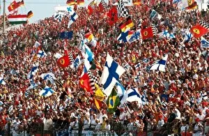 Images Dated 26th January 2001: Formula One World Championship: Finnish fans go wild as Hakkinen wins