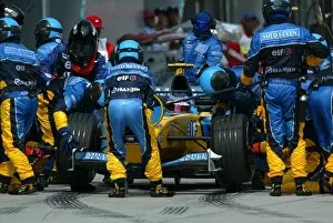 Images Dated 23rd March 2003: Formula One World Championship: Fourth placed Jarno Trulli Renault R23 makes a pit stop