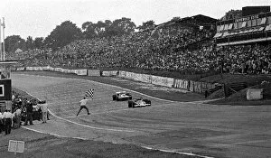 Images Dated 11th July 2001: Formula One World Championship: Jochen Rindt takes the flag in his Lotus 72C to win his 3rd Grand