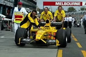 Images Dated 8th March 2003: Formula One World Championship: The Jordan team take their car back to the McLaren garage under