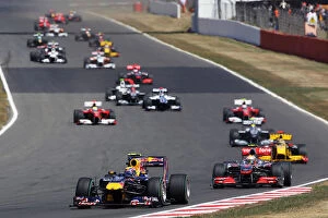Images Dated 11th July 2009: Formula One World Championship: Mark Webber Red Bull Racing RB6 leads at the start of the race