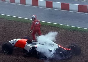 Images Dated 18th December 2002: Formula One World Championship: Michael Andretti gets out of his McLaren Ford MP4 / 8 after being