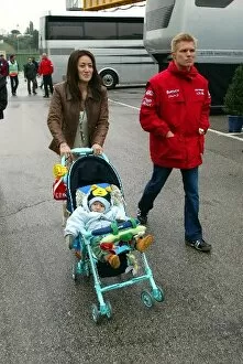 Images Dated 11th April 2002: Formula One World Championship: Mika Salo Toyota with wife Noriko Endo and their young child