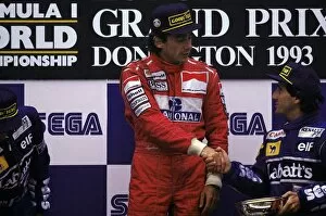 Donnington Park Collection: Formula One World Championship: The podium: Race winner Ayrton Senna McLaren shakes hands with
