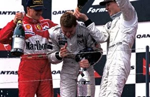 Images Dated 6th October 2004: Formula One World Championship: The podium finishers Michael Schumacher Ferrari 2nd