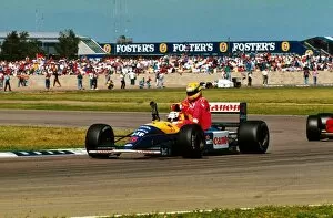 Winner Collection: Formula One World Championship: Race winner Nigel Mansell Williams FW14 carries back to the pits