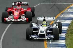 Images Dated 7th March 2004: Formula One World Championship: Ralf Schumacher Williams BMW FW26 leads Rubens Barrichello Ferrari