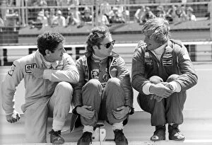 Victor Gallery: Formula One World Championship: Second placed Jody Scheckter Tyrrell talks with Niki Lauda Ferrari