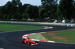 Images Dated 8th August 2001: Formula One World Championship: Test driver Luca Badoer Ferrari F1-2000 at the revised first