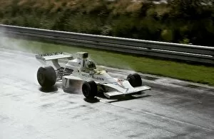 Images Dated 12th February 2003: Formula One World Championship: Twelfth placed Denny Hulme McLaren M23 practices during the wet