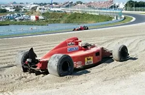 Images Dated 15th April 2003: Formula One World Championship: The wreckage of the Ferrari 641 of Alain Prost passed by team mate