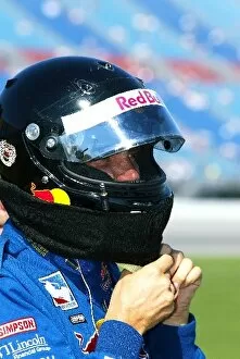 Images Dated 8th September 2002: Indy Racing League: Eddie Cheever Red Bull Team Cheever, straps on his helmet as he prepares to