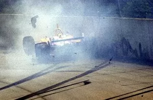Images Dated 1st July 2002: Jimmy Vasser crashed, but was unhurt after a collision with Kenny Brack at the start of the CART