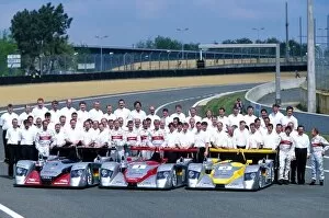 Images Dated 7th May 2002: Le Mans Pre-qualifying: The Audi Sport entries pose for a picture including Team personnel, managers