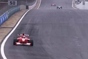 Images Dated 21st March 2000: Michael Schumacher leads the field