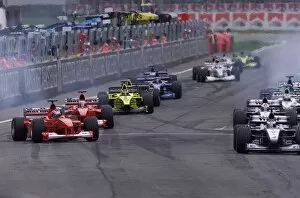 Images Dated 9th April 2000: Mika Hakkinen leads at the start: 2000 San Marino Grand Prix. RACE