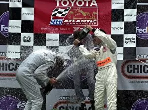 Images Dated 1st July 2002: Race winner Ryan Hunter-Reay is doused by teammate Roger Yusakawa at the Toyota Atlantic race at