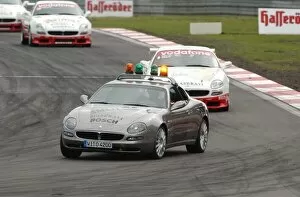 Images Dated 25th May 2003: The safety car comes out after the first lap due to a accident in the RTL Kurve