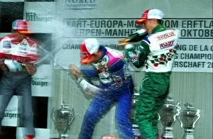 Images Dated 29th October 2001: World Karting Championships: Race 1 podium: 1st Sauro Cesetti, centre. 2nd Marco Ardigo, left