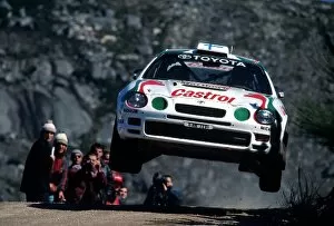 World Rally Championship: Juha Kankkunen Toyota Celica GT-Four with co-driver Nicky Grist flies through the air en