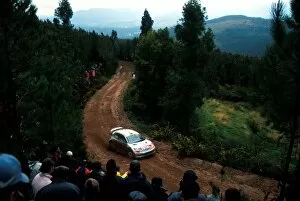 Images Dated 12th March 2001: World Rally Championship: Marcus Gronholm / Timo Rautiainen, Peugeot 206 WRC, 3rd place