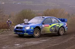 Images Dated 9th November 2003: World Rally Championship: Rally winners Petter Solberg / Phil Mills Subaru Impreza WRC 2003