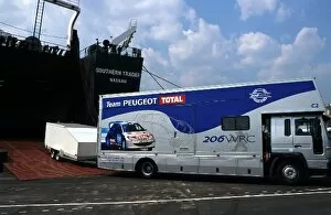 World Rally Championship: A Team Peugeot Total support vehicle is loaded onto The Southern Trader'