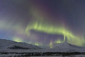Aurora Borealis At Twilight Above Angelcomb Mountain Along The Dempster Highway; Yukon, Canada Aurora Borealis At Twilight Above Angelcomb Mountain Along The Dempster Highway; Yukon, Canada