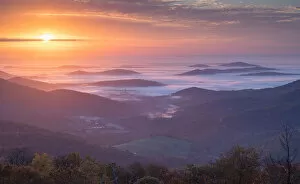 Autumn morning mist shrouds the Shenandoah Mountains in the Blue Ridge Mountains of Virginia