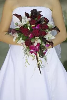 Images Dated 2nd September 2006: Brides Bouquet And Wedding Dress