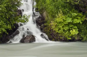 A Cascading Waterfall Flows Into Granite Creek, Turnagain Pass, Chugach National Forest A Cascading Waterfall Flows Into Granite Creek, Turnagain Pass, Chugach National Forest