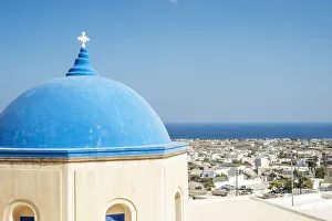 Church With A Blue Dome Roof And View Of The Aegean Sea; Megalochori, Santorini, Greece Church With A Blue Dome Roof And View Of The Aegean Sea; Megalochori, Santorini, Greece