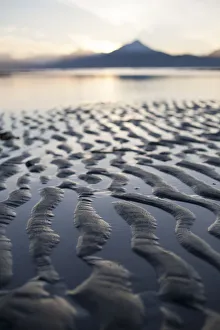 Close-Up Of The Ripples And Tide Pools On The Shores Of The Tidal Flats At Sunset; Homer, Alaska Close-Up Of The Ripples And Tide Pools On The Shores Of The Tidal Flats At Sunset; Homer, Alaska
