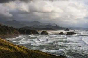 Clouds Hang Low Over The Oregon Coast; Cannon Beach, Oregon, United States Of America Clouds Hang Low Over The Oregon Coast; Cannon Beach, Oregon, United States Of America