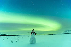 Digitally Altered, Snowman Watching Northern Lights, Winter, Eureka Summit, Glenn Highway, Southcentral Alaska