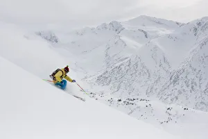 Downhill Skier In Fresh Powder In Chugach Mountains Of Turnagain Pass, Southcentral Alaska Downhill Skier In Fresh Powder In Chugach Mountains Of Turnagain Pass, Southcentral Alaska