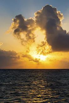 Dramatic Colourful Sky At Sunrise Reflecting Off Ocean With Backlit Clouds And Blue Sky; Akumal, Quintana Roo, Mexico Dramatic Colourful Sky At Sunrise Reflecting Off Ocean With Backlit Clouds And Blue Sky; Akumal, Quintana Roo, Mexico