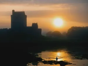 Dunguaire Castle, Kinvara, Co Galway, Ireland; Silhouette Of A 16Th Century Castle At Sunset Dunguaire Castle, Kinvara, Co Galway, Ireland; Silhouette Of A 16Th Century Castle At Sunset