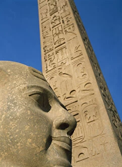 Images Dated 19th February 2009: Egypt, Detail of head of pharaoh in front of obelisk at entrance to Luxor Temple; Luxor