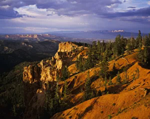 Evening Light Brightens The Ridges At Bryce Canyon National Park; Ruby's Inn, Utah, United States Of America Evening Light Brightens The Ridges At Bryce Canyon National Park; Ruby's Inn, Utah, United States Of America