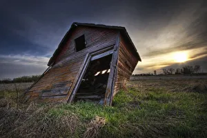 Falling Granary At Sunrise, Prairies In Edmonton, Alberta Falling Granary At Sunrise, Prairies In Edmonton, Alberta